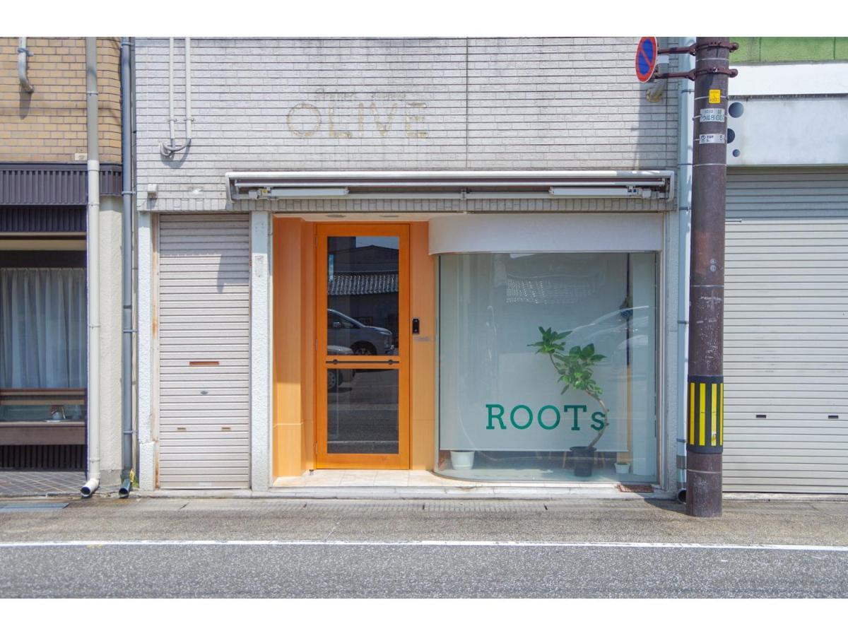 Travelers' house ROOTs Hostel Takaoka Buitenkant foto