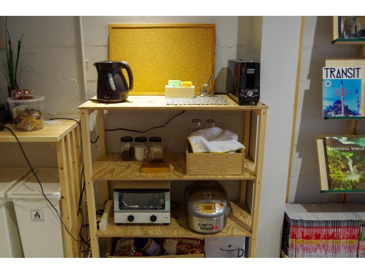 Travelers' house ROOTs Hostel Takaoka Buitenkant foto
