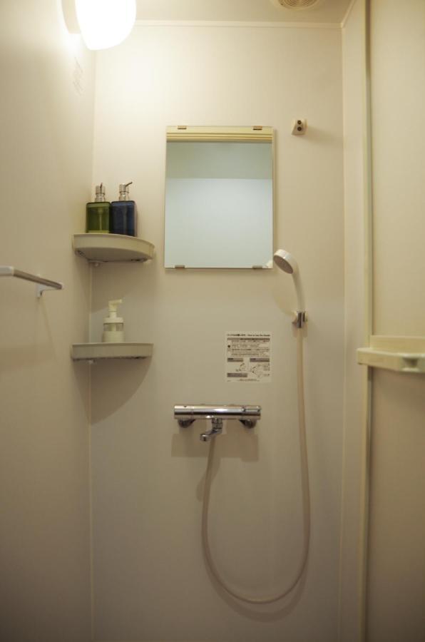 Travelers' house ROOTs Hostel Takaoka Buitenkant foto