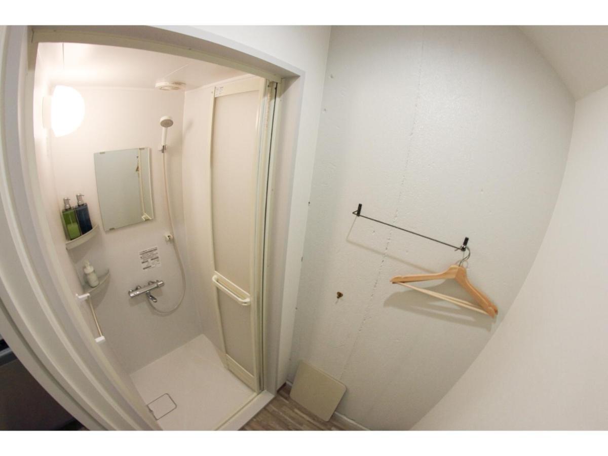 Travelers' house ROOTs Hostel Takaoka Buitenkant foto
